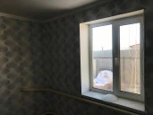 Часть жилого дома площадью 49,5 кв. м и земельный участок 300 кв. м в с. Воскресенское Саратовская области